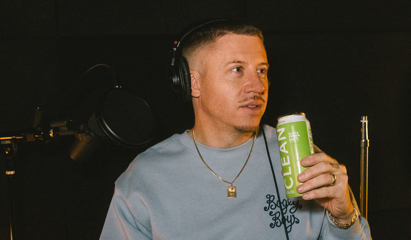 Macklemore in the recording studio holding a can of Lemon Lime CLEAN Cause
